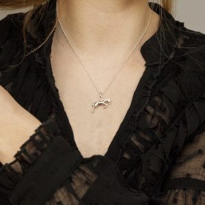lady wearing horse necklace